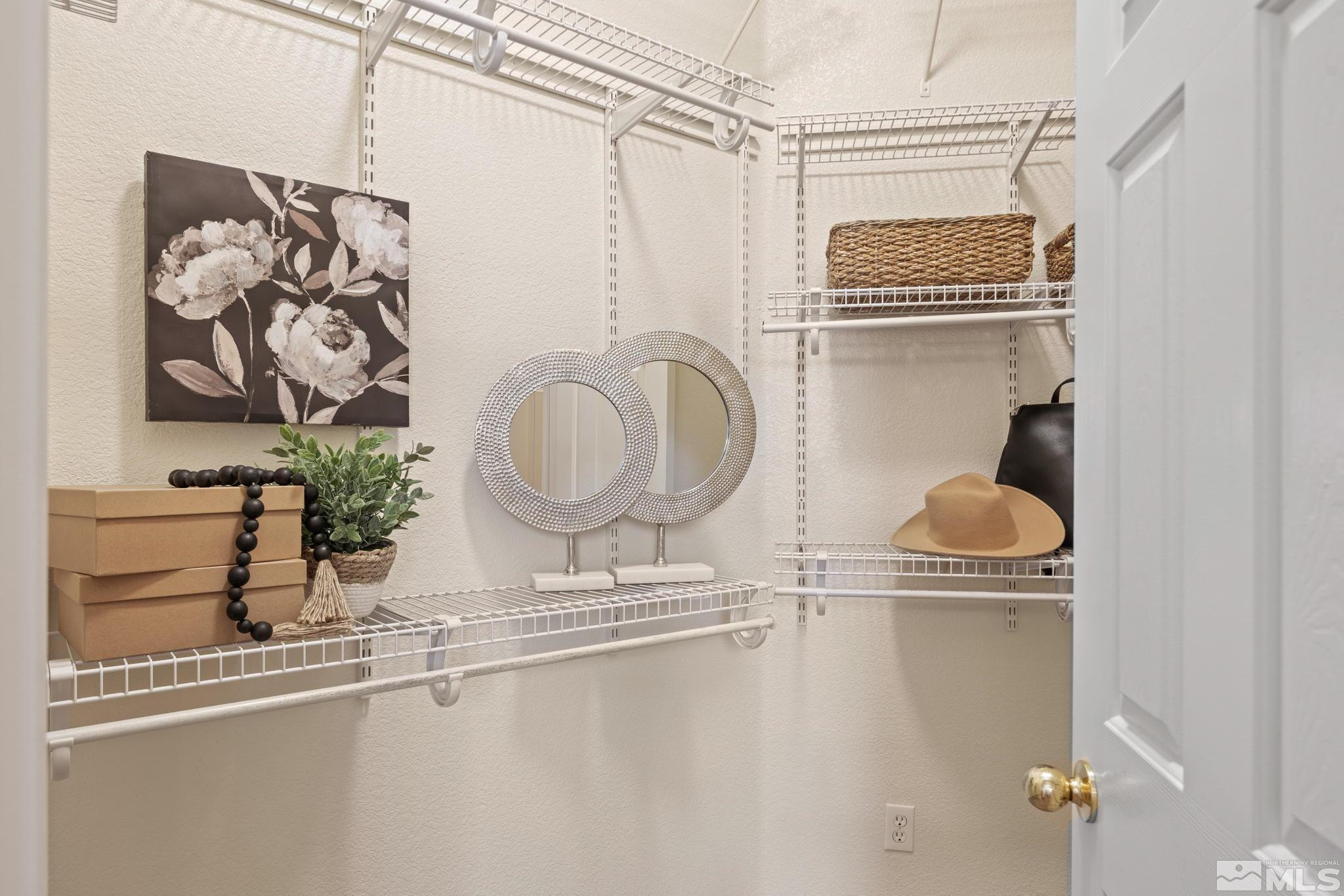 9516 Rockcrawler Road Reno, NV 89521 - Photo 24 of 39 a bathroom with a sink and a mirror