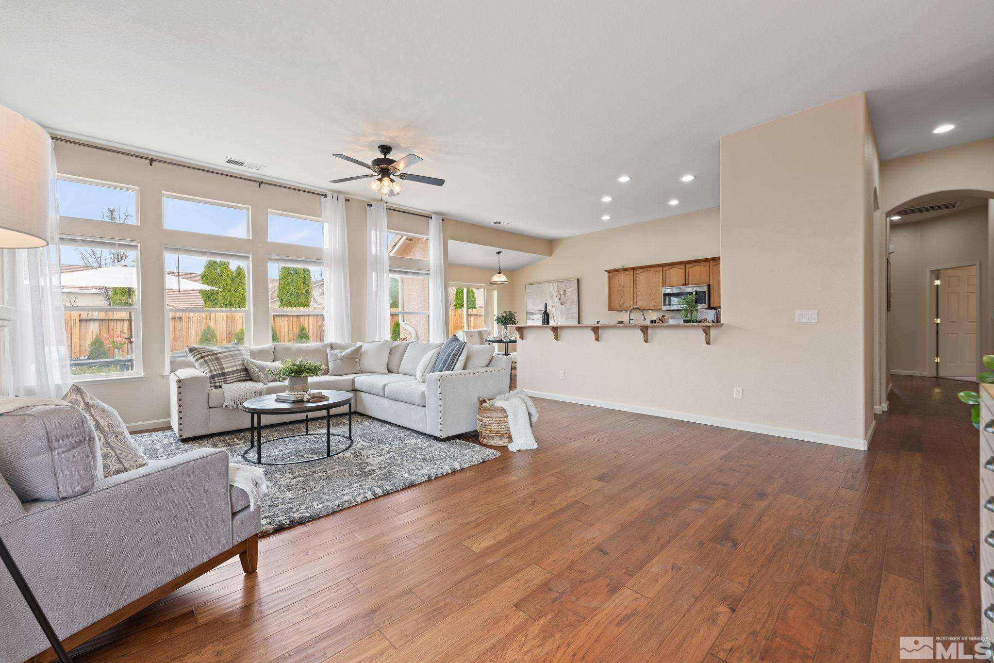 9516 Rockcrawler Road Reno, NV 89521 - Photo 8 of 39 a living room with furniture and a large window