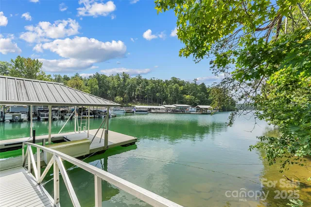 a view of swimming pool with a patio