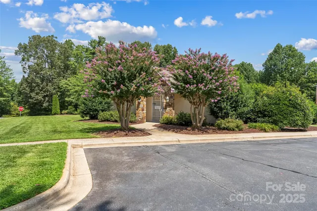 a view of a pathway with a lake view