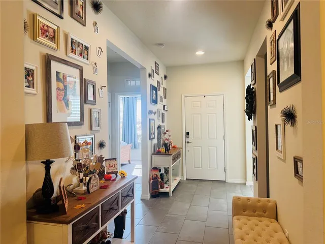 a view of a livingroom with furniture and toys