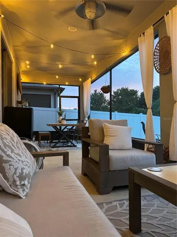 a outdoor living space with furniture and a fireplace