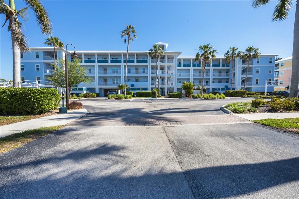 8413 Placida Road, Unit 407 Placida, FL 33946 - Photo 2 of 57 a view of building with a street