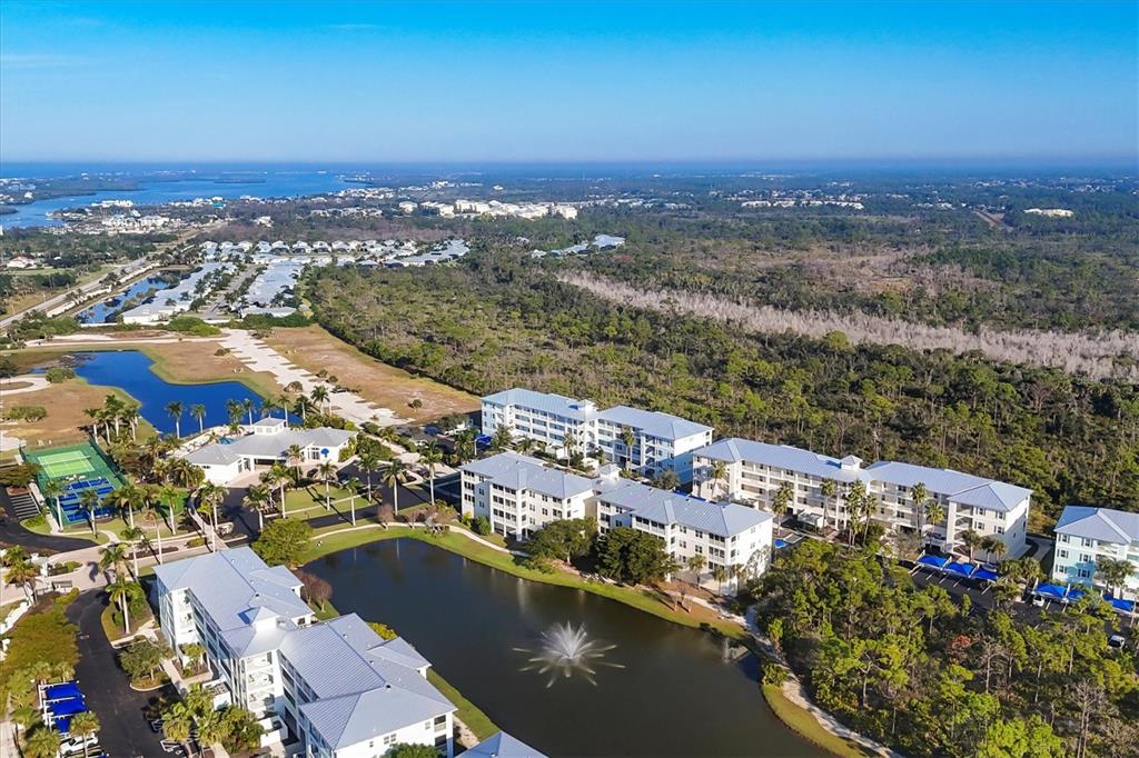 8413 Placida Road, Unit 407 Placida, FL 33946 - Photo 25 of 57 an aerial view of residential building with outdoor space