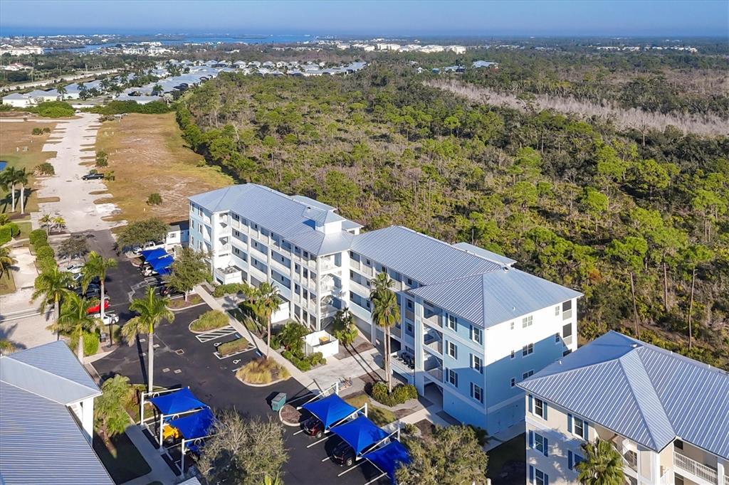8413 Placida Road, Unit 407 Placida, FL 33946 - Photo 27 of 57 an aerial view of multiple house