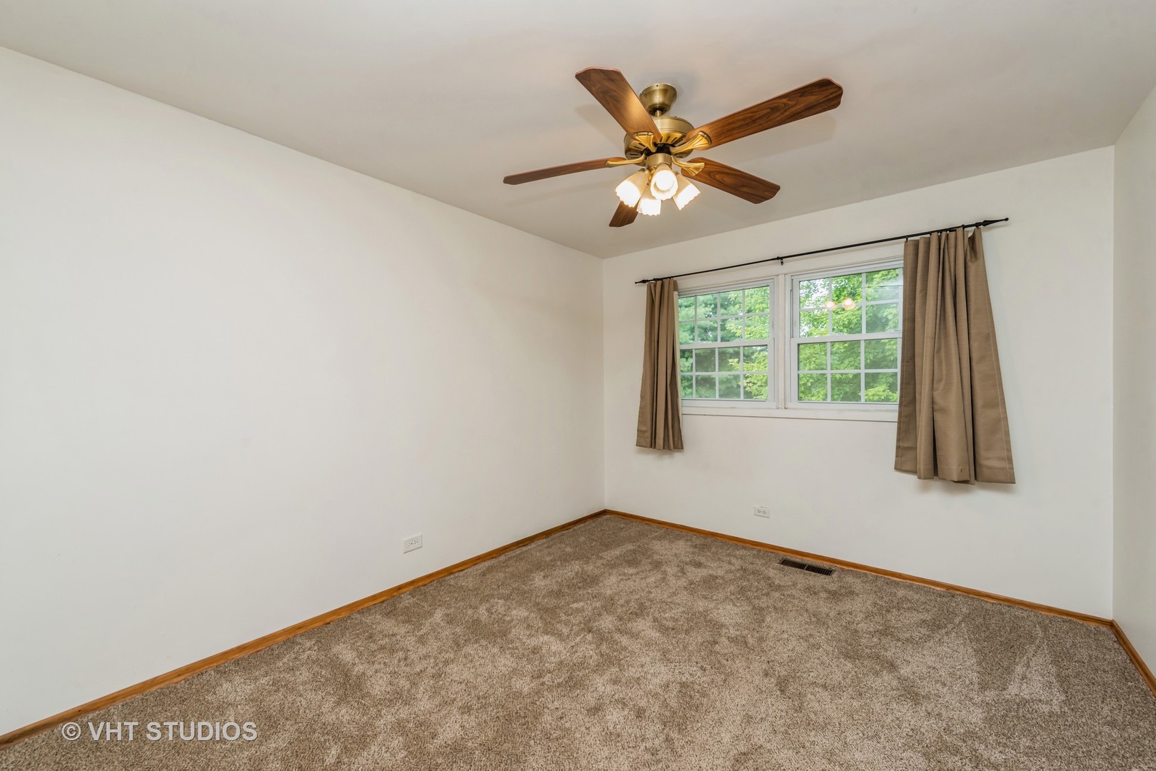 8308 Schmidt Street Spring Grove, IL 60081 - Photo 12 of 33 a view of an empty room with a window