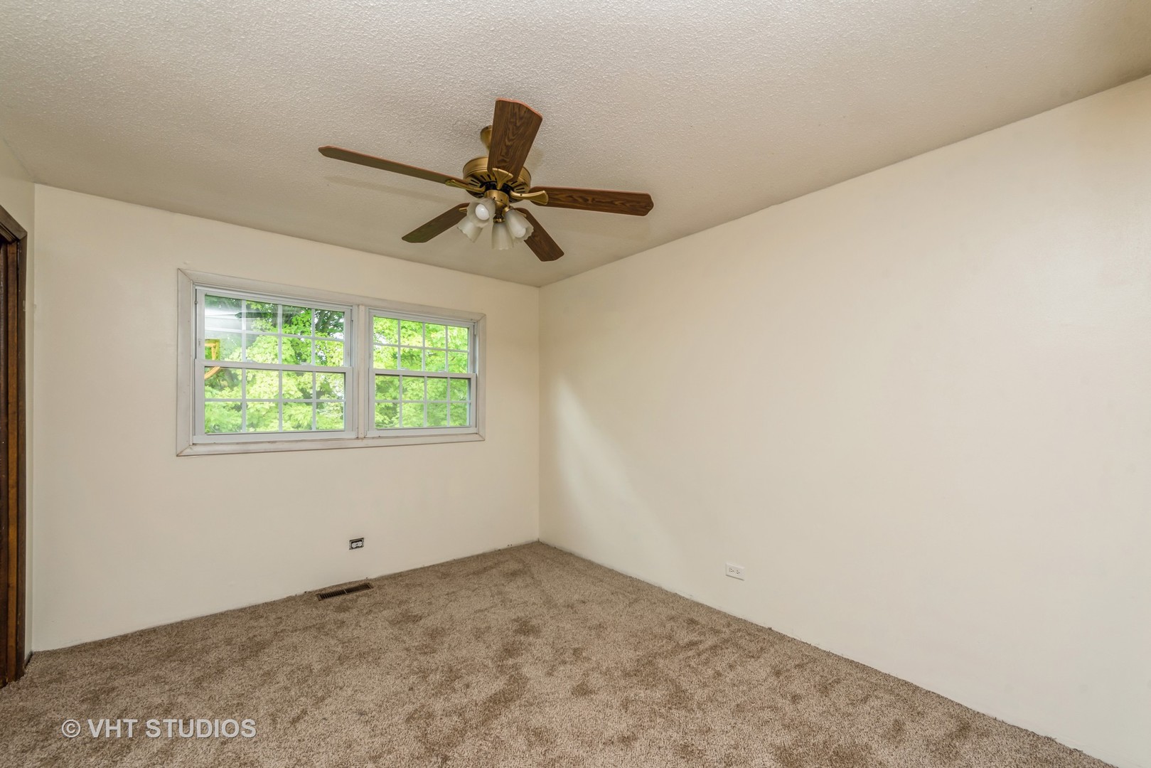 8308 Schmidt Street Spring Grove, IL 60081 - Photo 13 of 33 a view of a big room with carpet