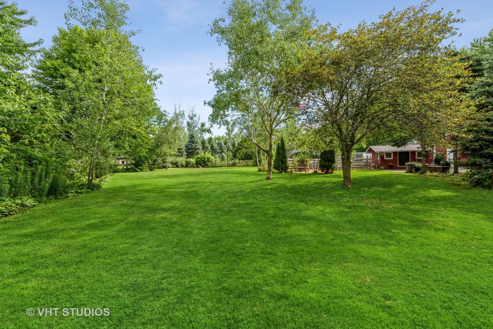 8308 Schmidt Street Spring Grove, IL 60081 - Photo 18 of 33 a view of a park with trees and grass