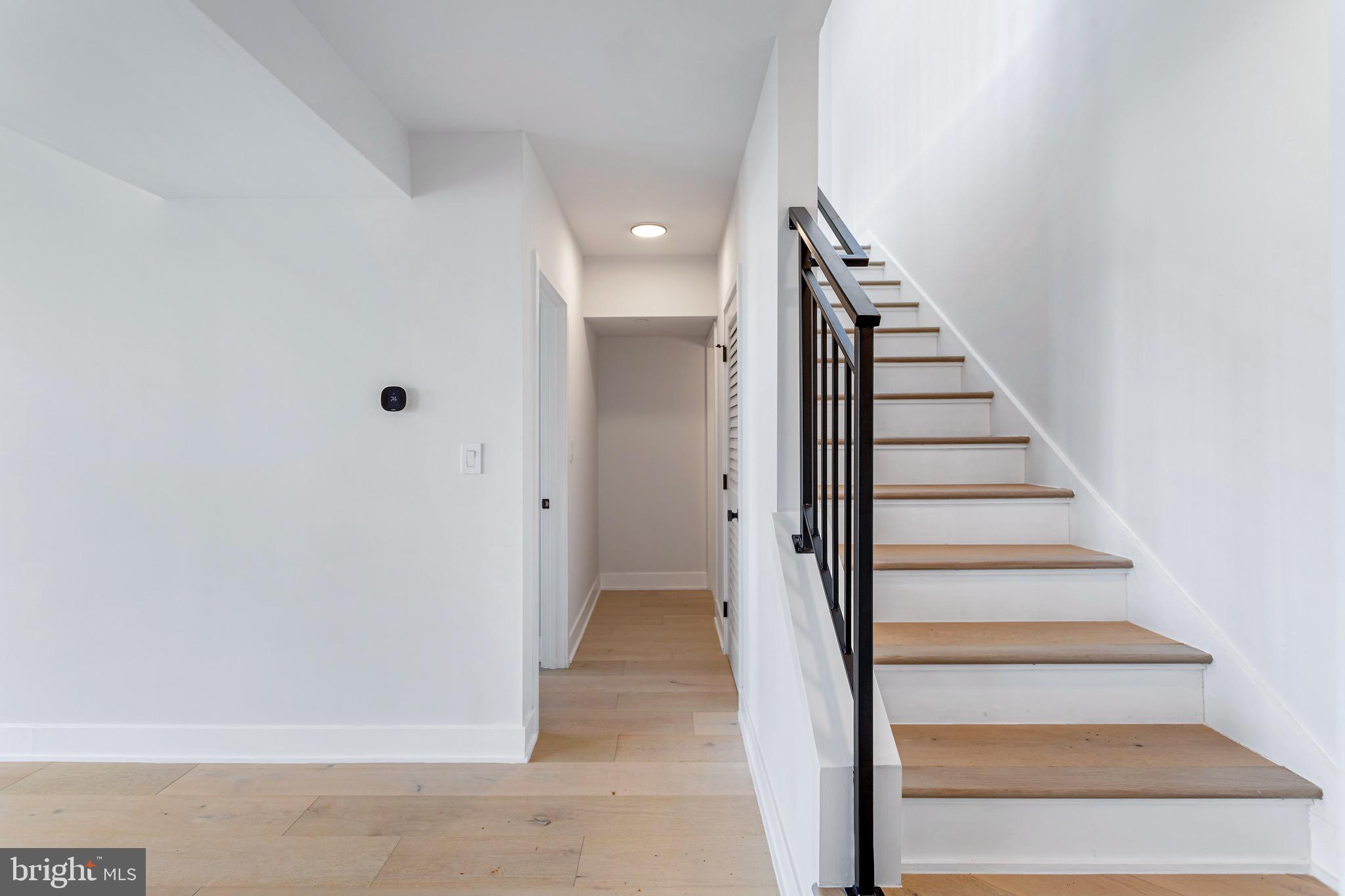 845 19th Street Northeast, Unit PH12 Washington, DC 20002 - Photo 18 of 23 a view of entryway and hall with wooden floor
