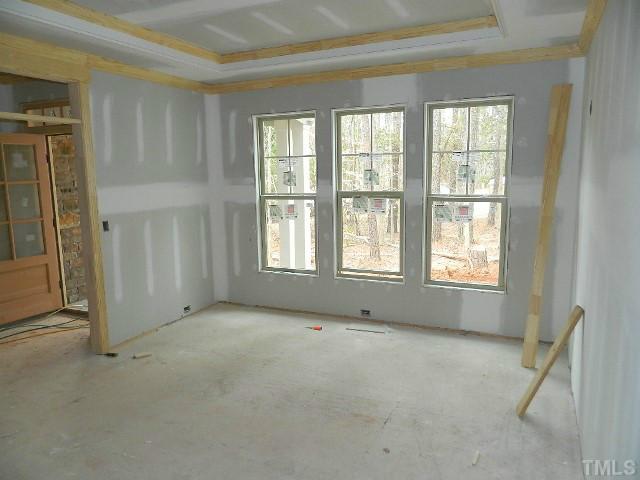 9404 Carlswood Court Raleigh, NC 27613 - Photo 7 of 20 a view of an empty room with a window