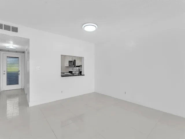 an empty room with a bathroom