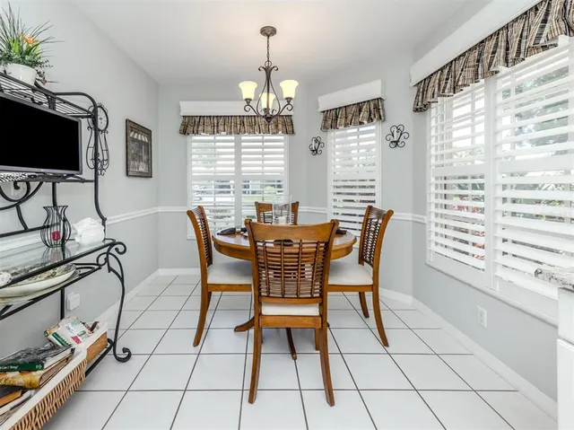 a bathroom with a double vanity sink a mirror and a shower