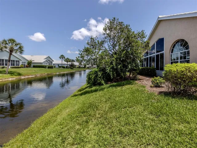 a view of a chairs and table in a patio