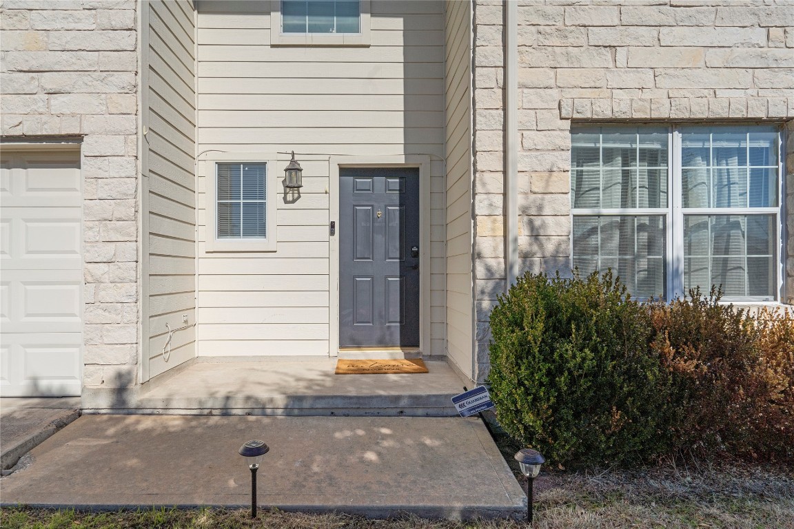 202 Rinehardt Street Hutto, TX 78634 - Photo 6 of 31 a view of a house with potted plants