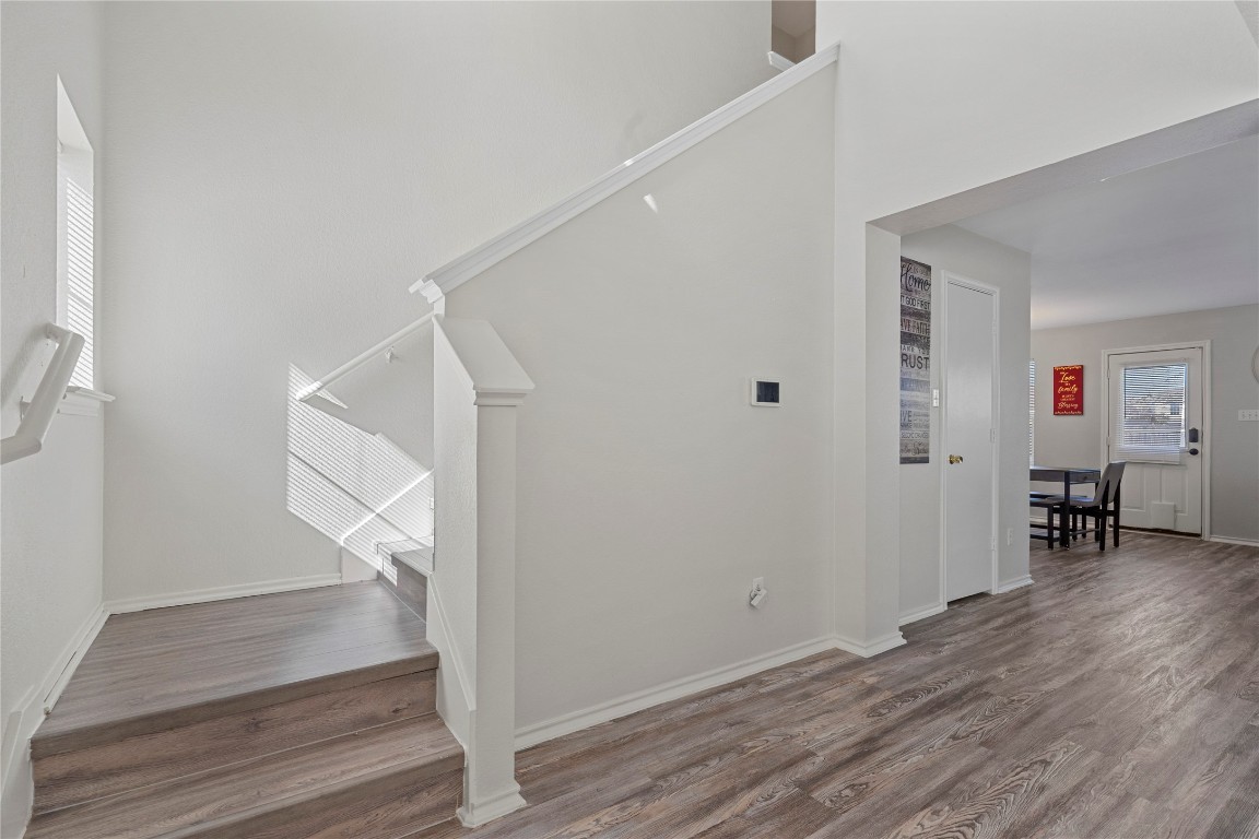 202 Rinehardt Street Hutto, TX 78634 - Photo 7 of 31 a view of entryway with wooden floor
