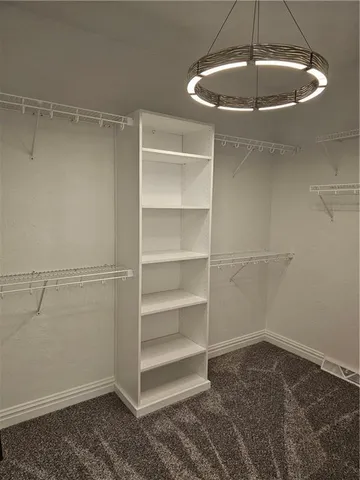 a view of a room with racks on the wall