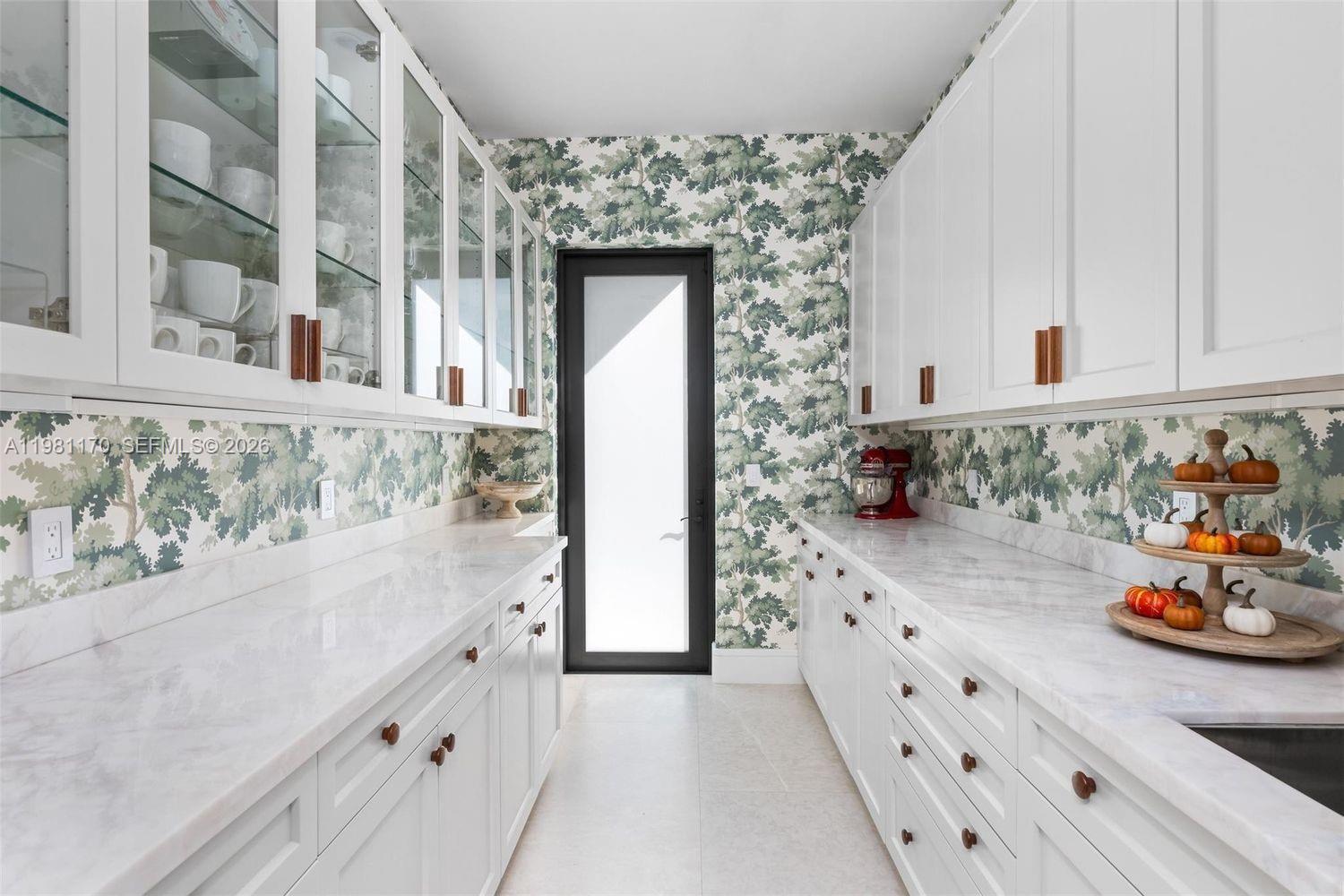 2300 Northeast 34th Court Lighthouse Point, FL 33064 - Photo 19 of 50 a bathroom with a sink and a mirror