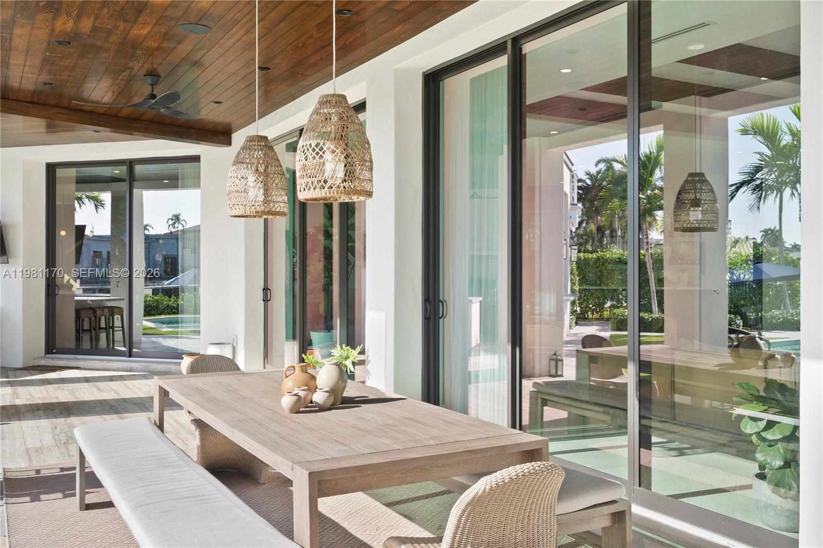 2300 Northeast 34th Court Lighthouse Point, FL 33064 - Photo 40 of 50 a view of a balcony dining table and chairs