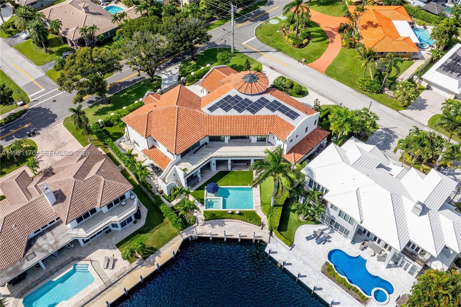 2300 Northeast 34th Court Lighthouse Point, FL 33064 - Photo 49 of 50 an aerial view of a house with a yard basket ball court