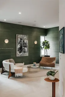 a room with a table and chairs
