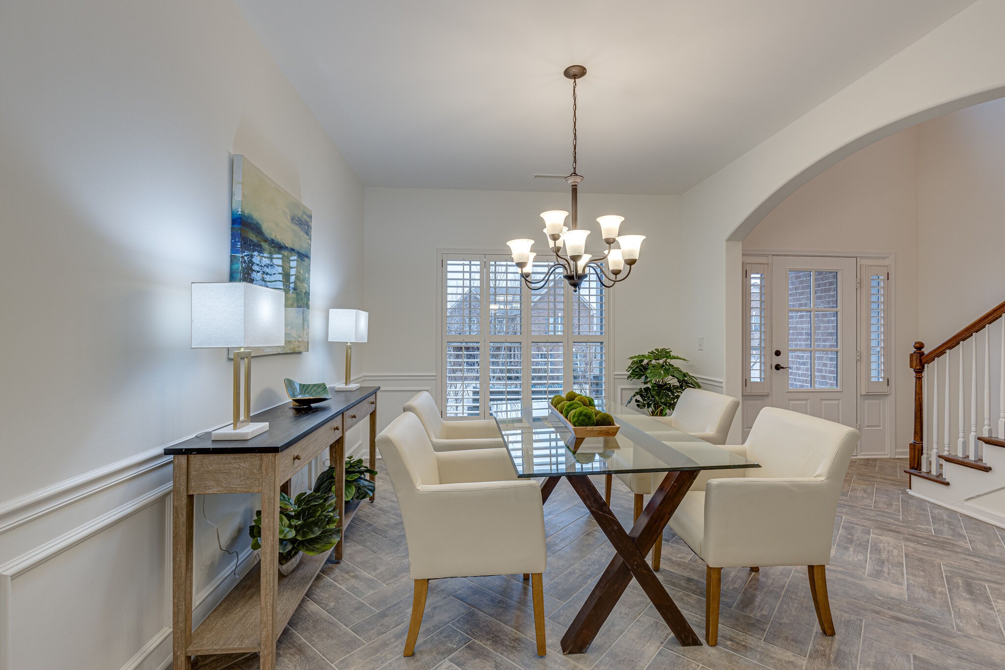 1005 Kyle Road Spring Hill, TN 37174 - Photo 3 of 29 a view of a dining room with furniture a chandelier and wooden floor