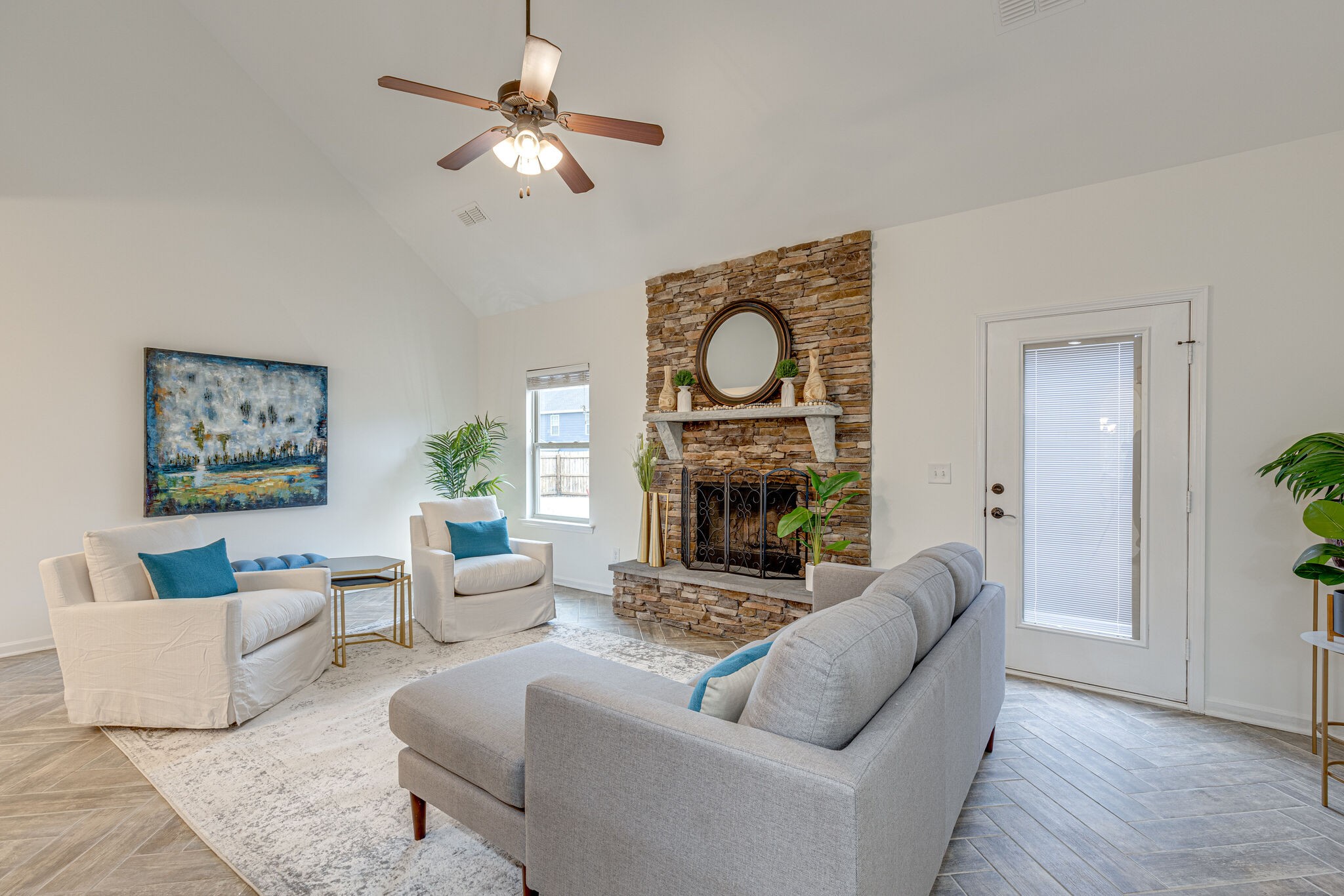 1005 Kyle Road Spring Hill, TN 37174 - Photo 5 of 29 a living room with furniture a fireplace and a window