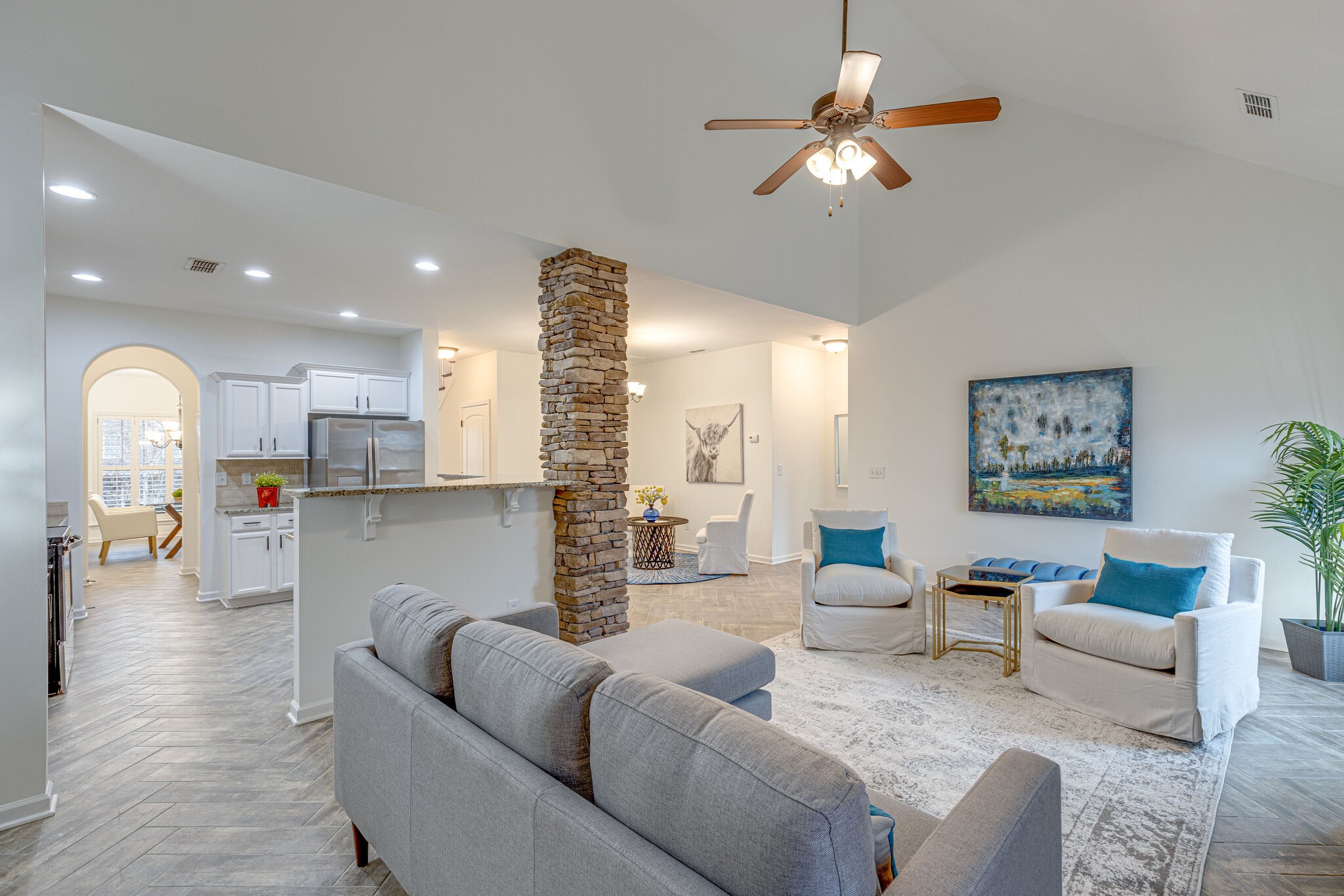 1005 Kyle Road Spring Hill, TN 37174 - Photo 6 of 29 a living room with furniture and a chandelier