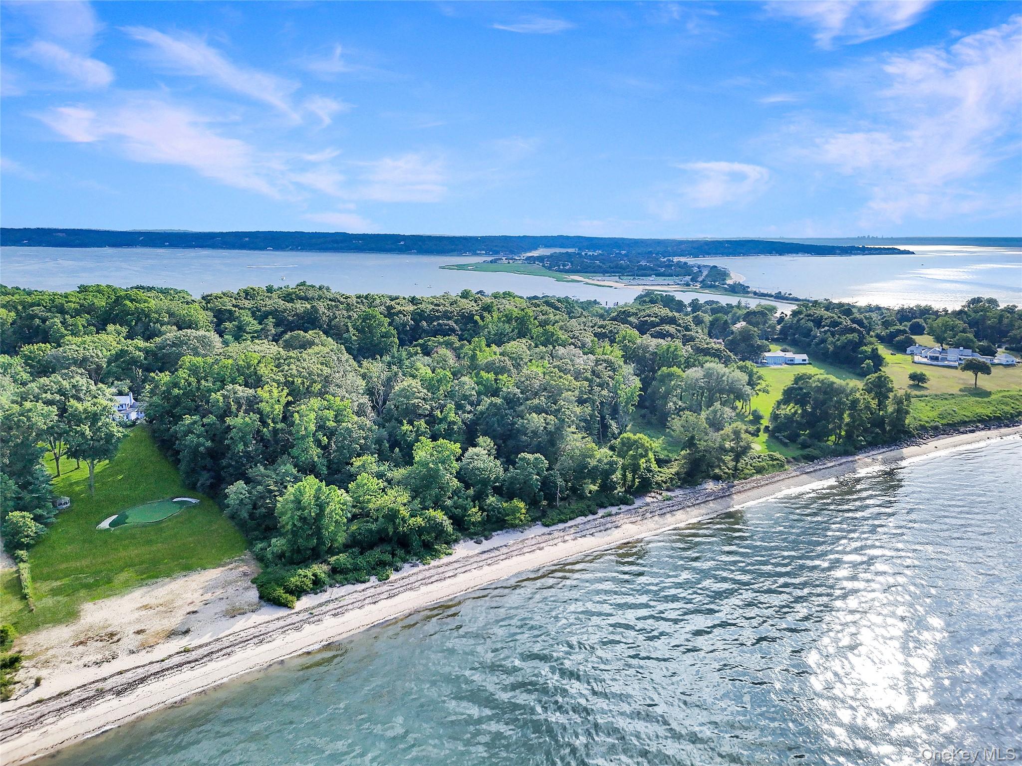 144 Centre Island Road Centre Island, NY 11771 - Photo 3 of 12 a view of a yard with an outdoor space