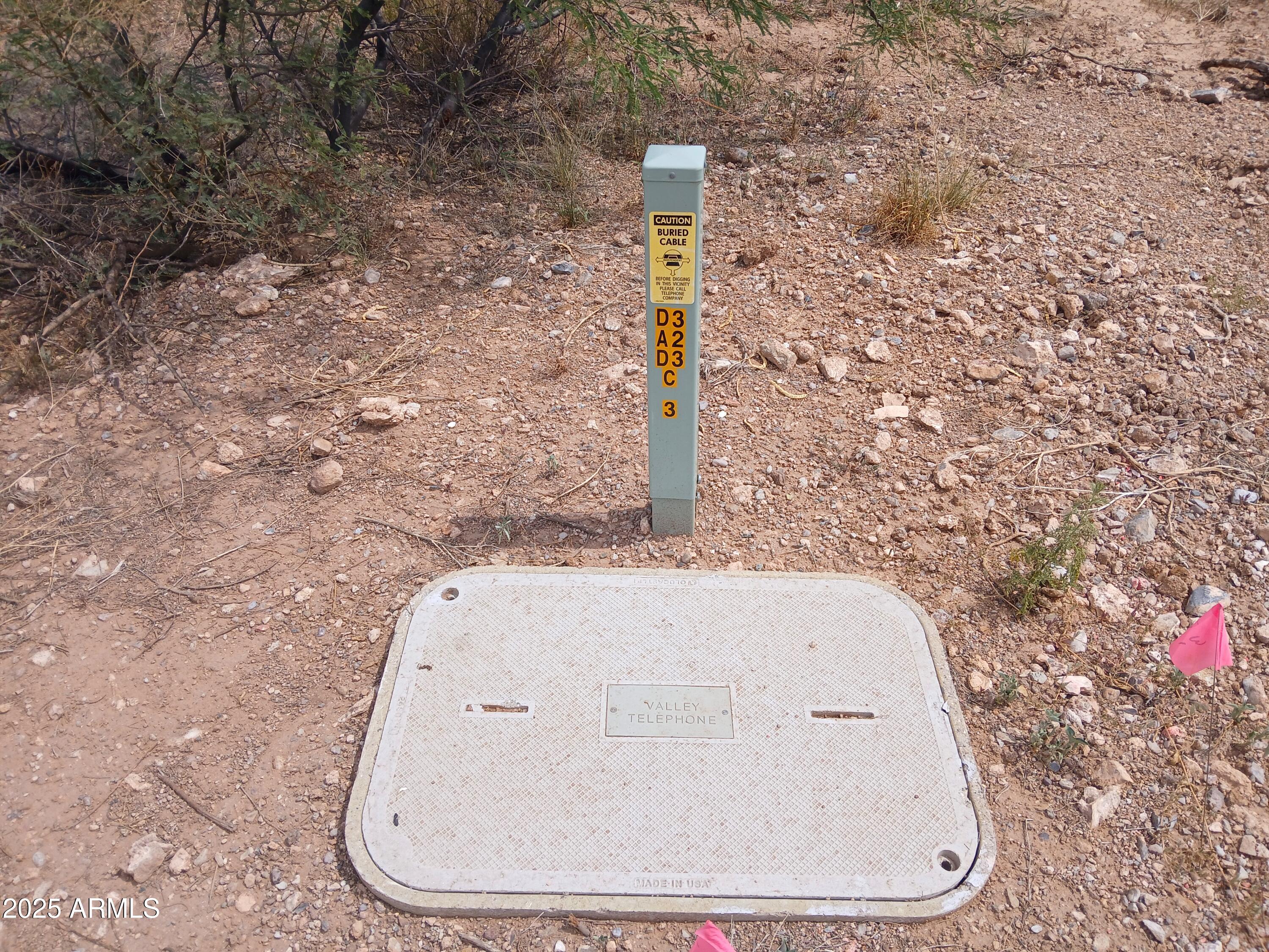 Tbd West Dragoon Road Cochise, AZ 85606 - Photo 7 of 35 a bathroom with a granite countertop sink and mirror