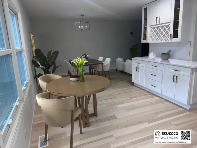 a view of a dining room with furniture