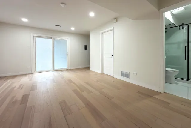 a view of livingroom with hardwood floor and sink