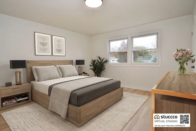 a bed room with a bed and a window