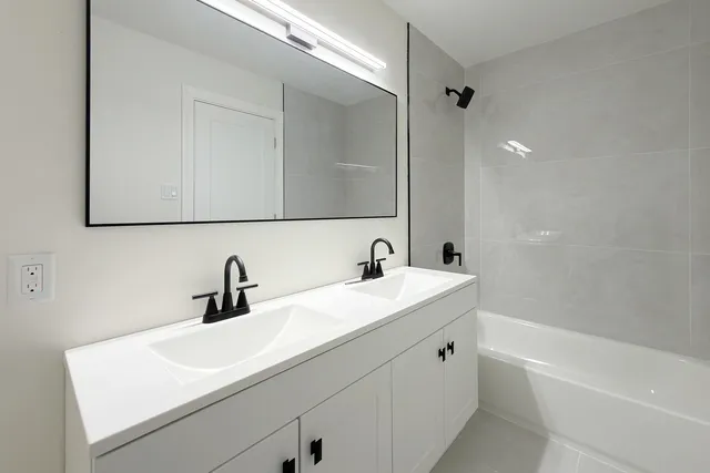a bathroom with a sink and a bathtub