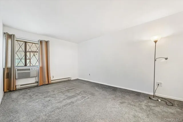 a kitchen with stainless steel appliances granite countertop a sink and a white cabinets