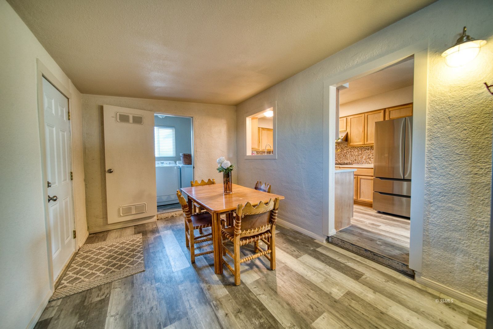 4047 Felspar Avenue Ridgecrest, CA 93555 - Photo 10 of 49 a workspace with wooden floor