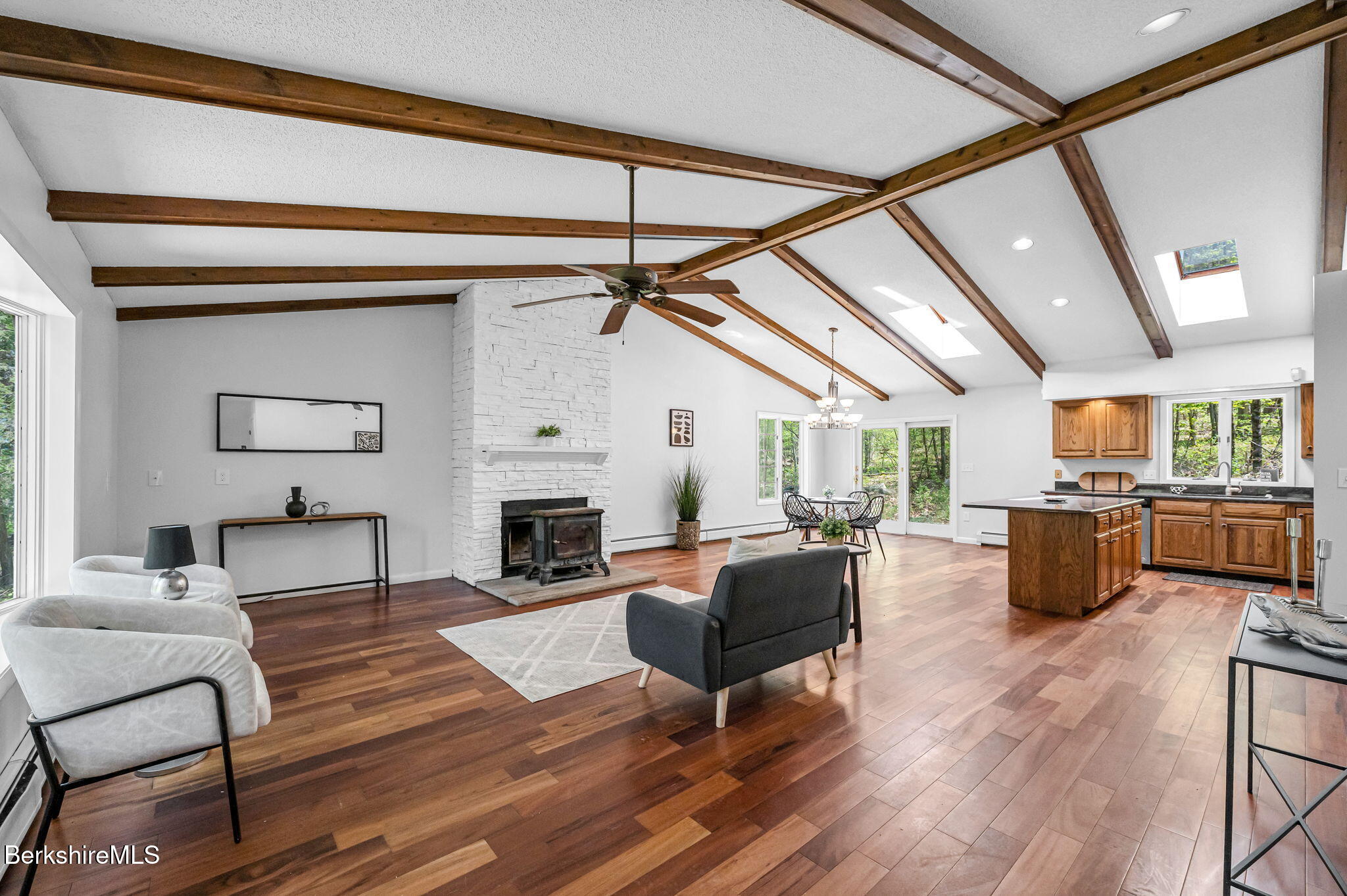 1874 Home Road Sheffield, MA 01230 - Photo 2 of 42 a living room with fireplace furniture and a wooden floor