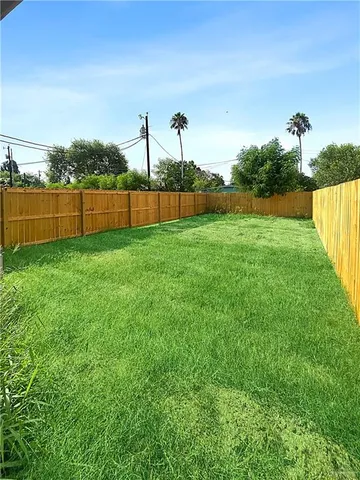 a view of a yard and entertaining space