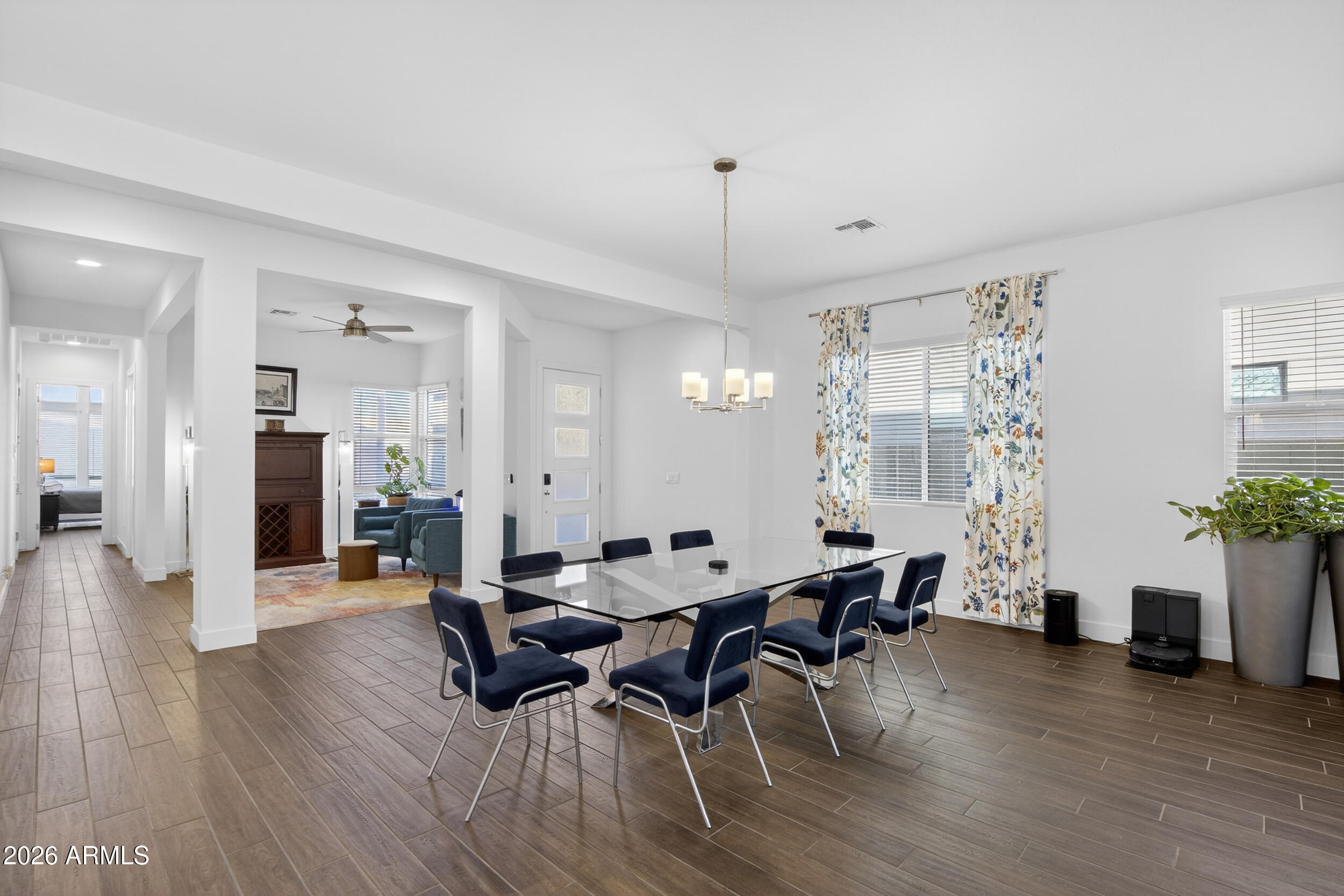 939 East Paseo Way Phoenix, AZ 85042 - Photo 12 of 78 a living room with furniture and wooden floor