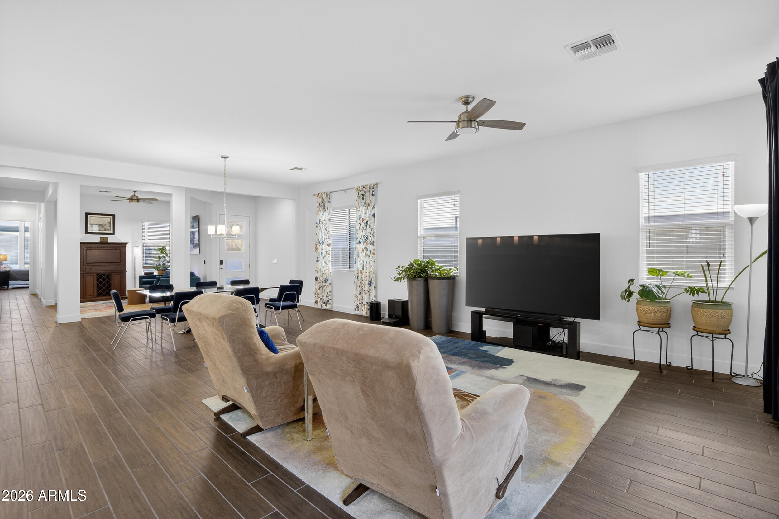 939 East Paseo Way Phoenix, AZ 85042 - Photo 22 of 78 a living room with furniture and a flat screen tv