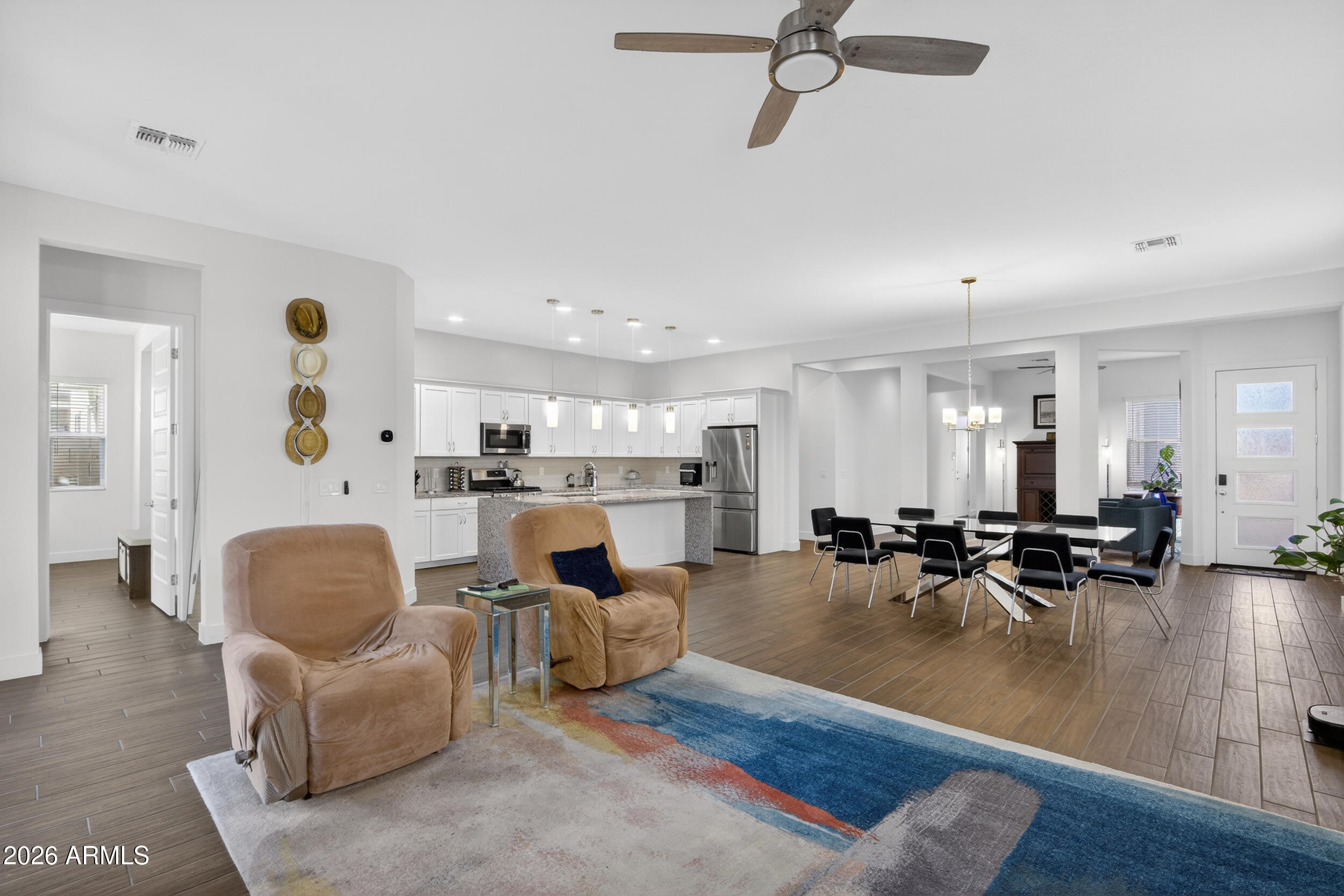 939 East Paseo Way Phoenix, AZ 85042 - Photo 23 of 78 a living room with furniture and kitchen view