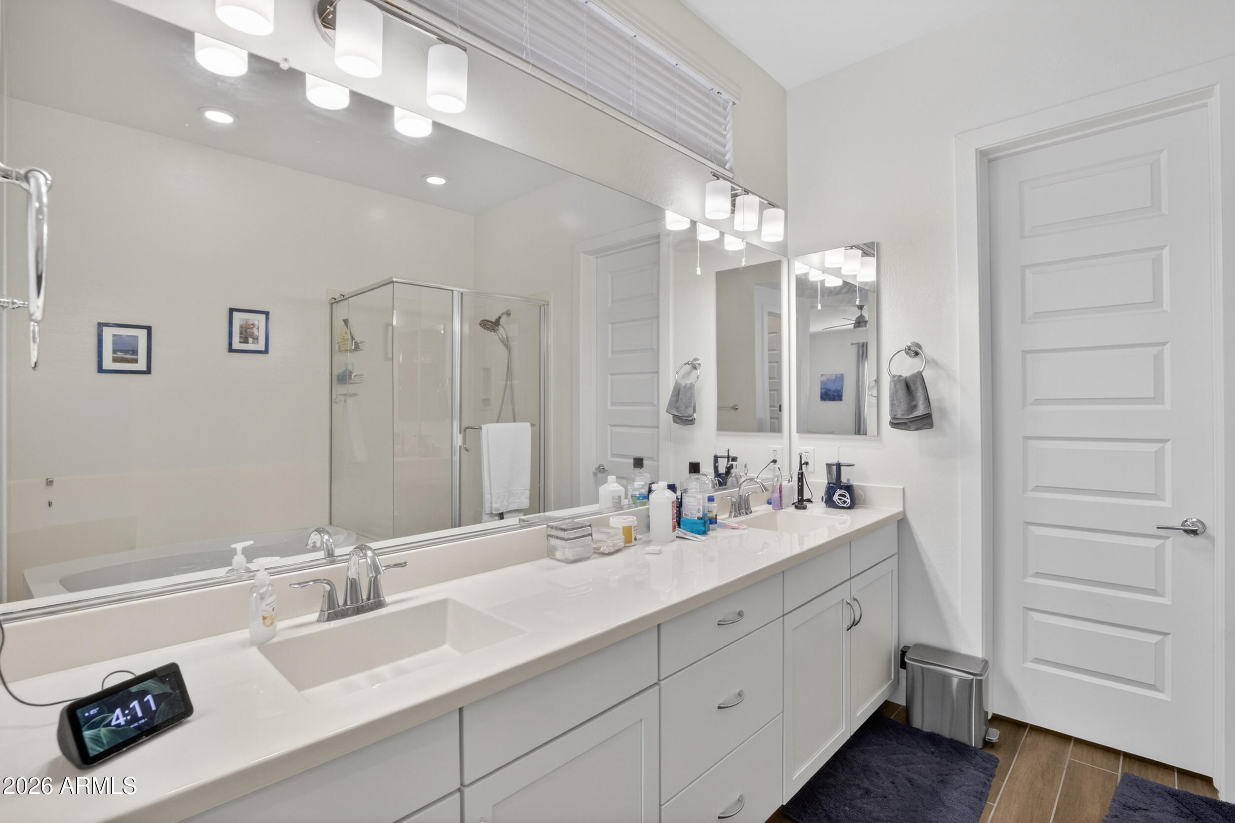 939 East Paseo Way Phoenix, AZ 85042 - Photo 29 of 78 a bathroom with a double vanity sink mirror and double