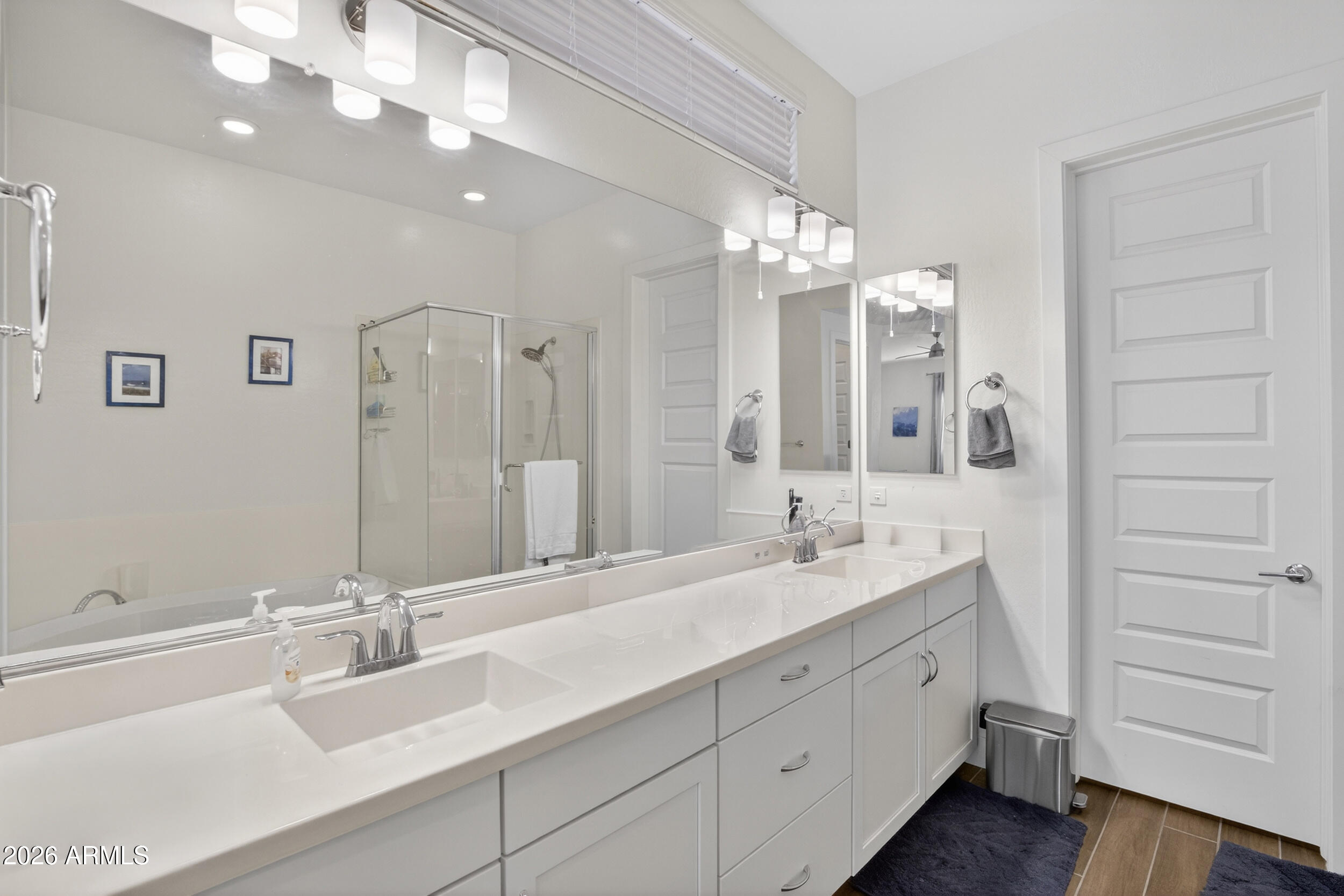 939 East Paseo Way Phoenix, AZ 85042 - Photo 30 of 78 a bathroom with a double vanity sink mirror and double
