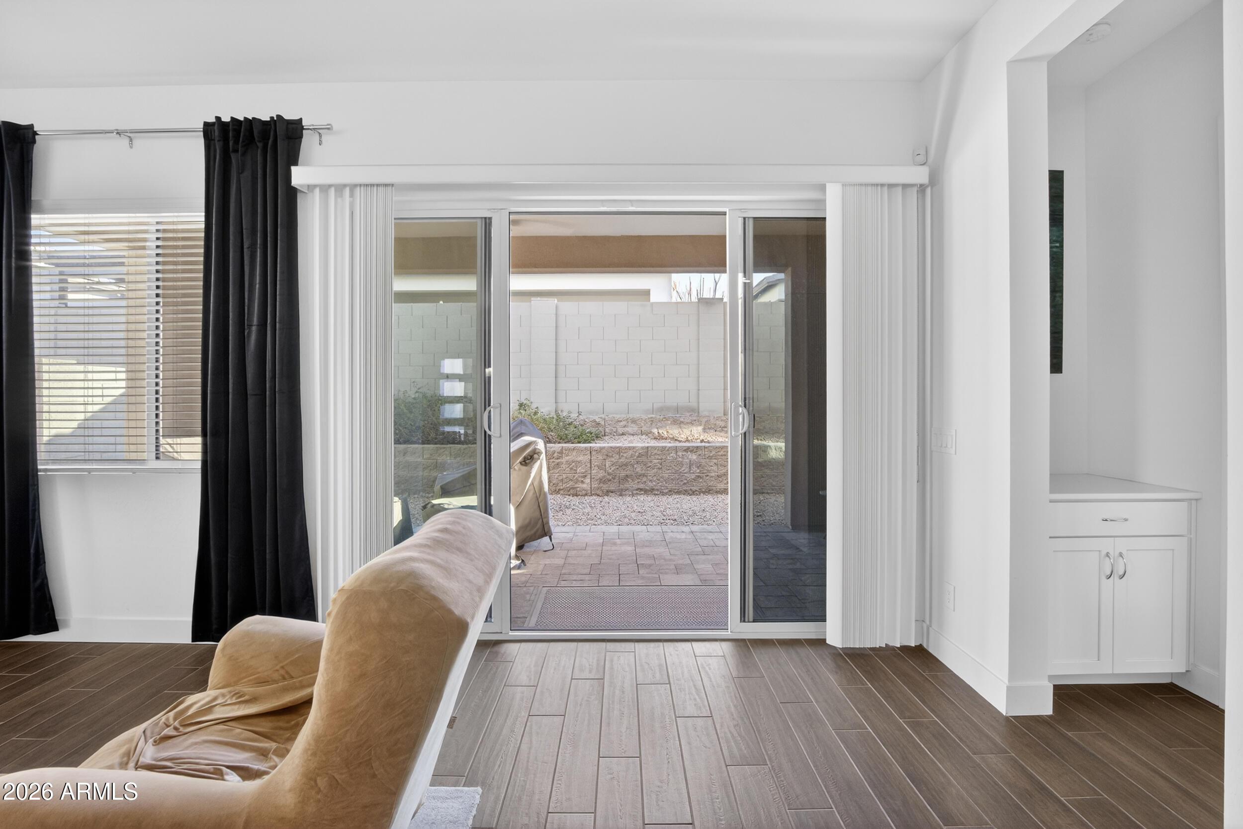 939 East Paseo Way Phoenix, AZ 85042 - Photo 45 of 78 a living room with furniture and a large window