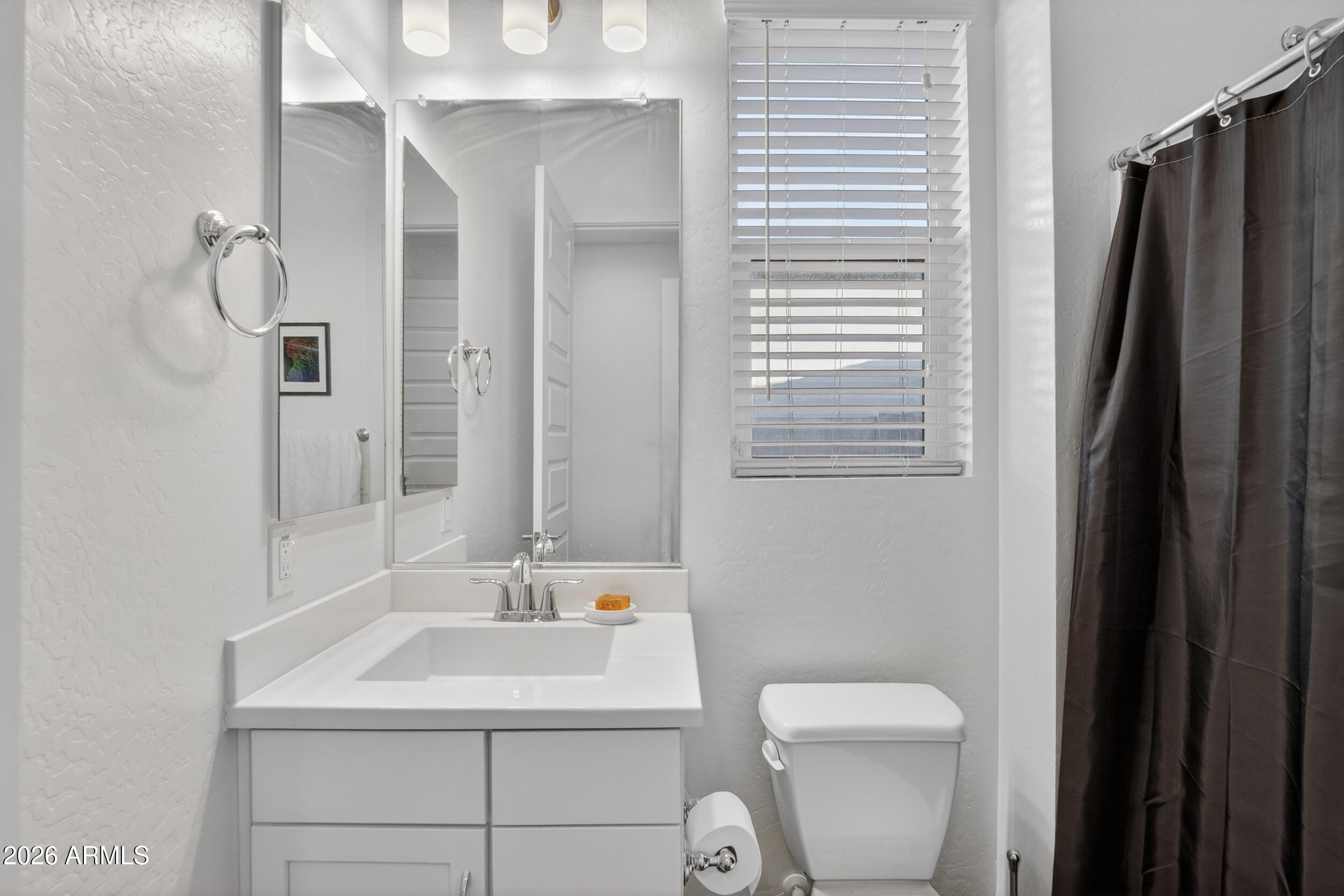 939 East Paseo Way Phoenix, AZ 85042 - Photo 53 of 78 a bathroom with a sink toilet and shower