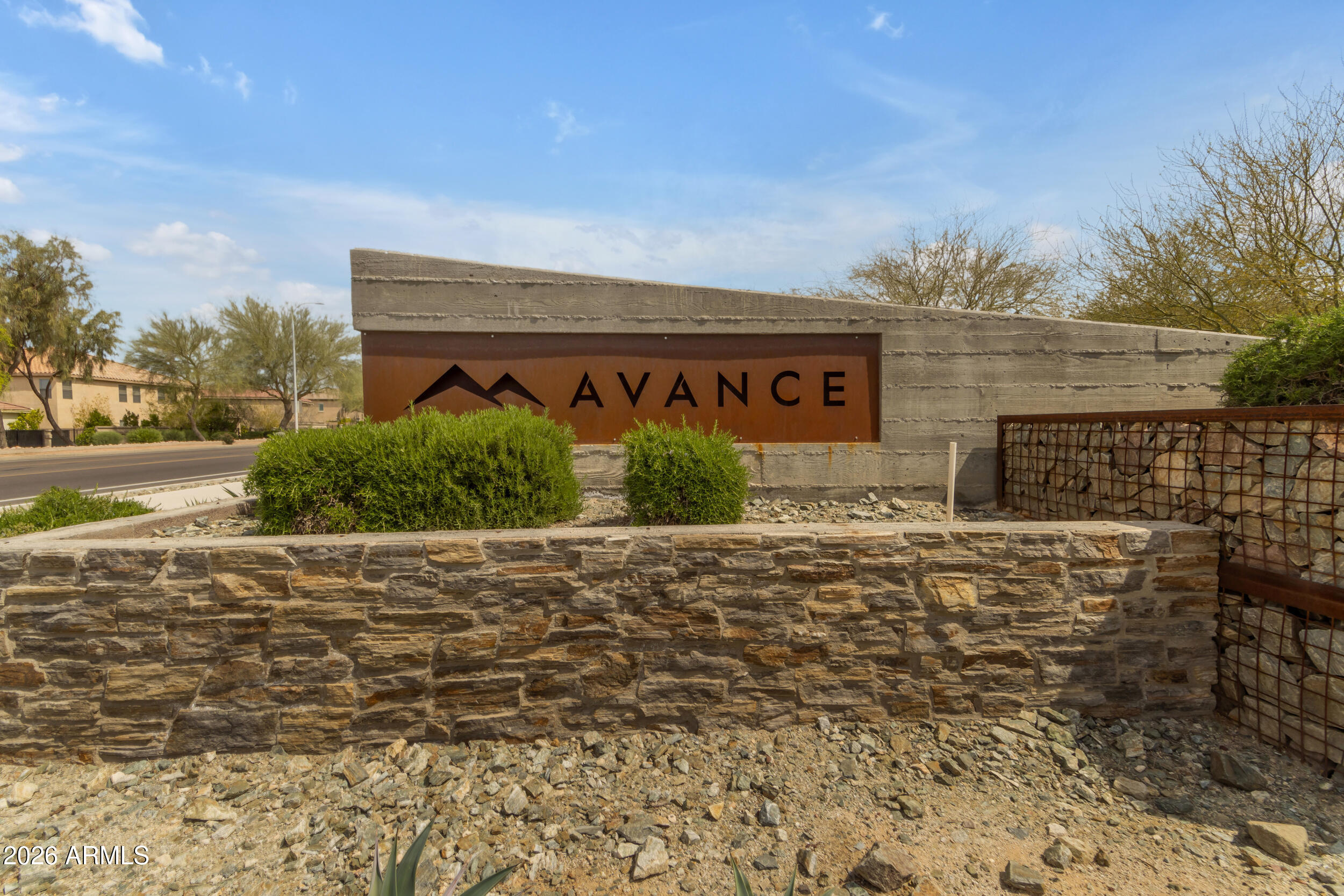 939 East Paseo Way Phoenix, AZ 85042 - Photo 64 of 78 a front view of a house with a yard and garage