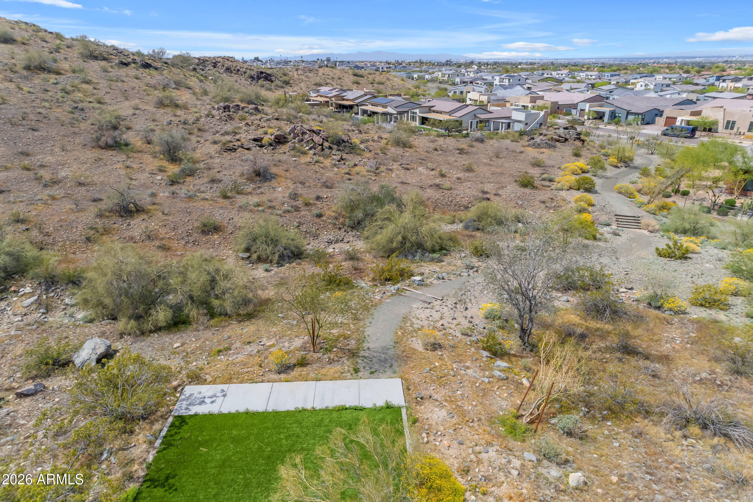 939 East Paseo Way Phoenix, AZ 85042 - Photo 76 of 78 a view of a yard with an ocean