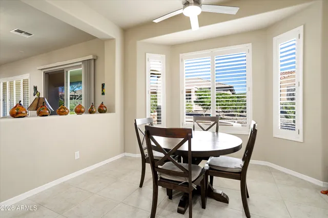 a bedroom with a bed and a tv