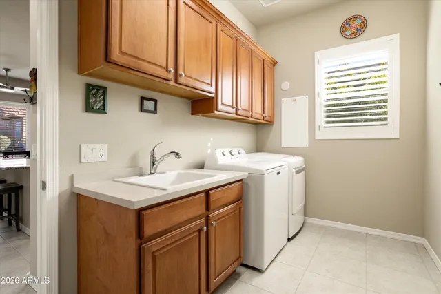 a bathroom with a sink toilet and mirror