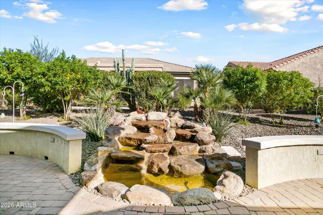 a large kitchen with a large counter top kitchen appliances and a sink