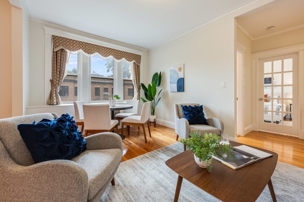 3 Crawford Street, Unit 9 Cambridge, MA 02139 - Photo 11 of 23 a living room with furniture and floor to ceiling windows